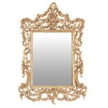 A CONTINENTAL STYLE GILT-METAL MIRROR, 20TH CENTURY the rectangular plate within a pierced and