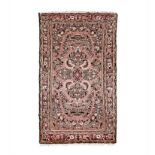 A BIRJALOU RUG, WEST PERSIA, MODERN the rose field with a floral medallion and spandrels, all with