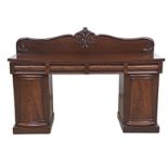 A VICTORIAN MAHOGANY PEDESTAL SIDEBOARD the rectangular top surmounted by a shaped moulded back