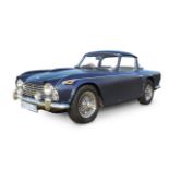 A 1965 TRIUMPH TR4 Colour: navy blue, 2.1 litre motor, walnut wood dash, tan leather upholstery,