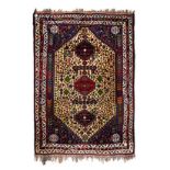 AN ABADEH RUG, PERSIA, MODERN the gold field with four stepped medallions and indigo spandrels,