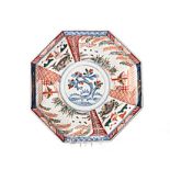 A JAPANESE IMARI OCTAGONAL PLATE, MEIJI, 1868 – 1912 the central rondel painted with a blossoming