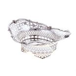 A GEORGE V SILVER BASKET, CHARLES CLEMENT PILLING, LONDON, 1911 the shaped oval body pierced with