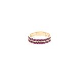 A RUBY AND DIAMOND HALF-ETERNITY RING set to the centre with a row of round brilliant-cut diamonds