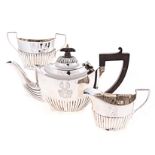 AN ASSOCIATED SILVER BACHELOR TEA SERVICE, W. AITKEN AND H.C. DAVIS, BIRMINGHAM, 1906 AND 1919