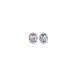 A PAIR OF AQUAMARINE AND DIAMOND EAR STUDS each centred with an oval mixed-cut aquamarine weighing