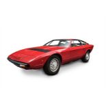 A 1973 MASERATI KHAMSIN Colour: red with cream leather upholstery. Left hand drive, not currently