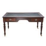 A VICTORIAN-STYLE MAHOGANY WRITING TABLE the rectangular top with gilt-tooled leather inset