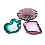A GROUP OF THREE GLASS ASHTRAYS, 20TH CENTURY each of various form, colour and decoration, the
