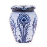 A MOORCROFT FLORIANWARE ‘PEACOCK’ PATTERN JAR WITH COVER, 1899 – 1906 of tapering ovoid form,