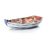 A JAPANESE IMARI BOAT-SHAPED DISH, MEIJI, 1868 – 1912 painted with a bird in flight amongst