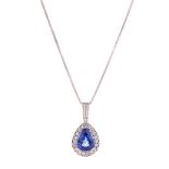 A TANZANITE AND DIAMOND PENDANT NECKLACE claw set to the centre with a pear-shaped tanzanite