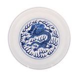 A CHINESE BLUE AND WHITE PLATE painted with a dragon chasing a flaming pearl, six character mark