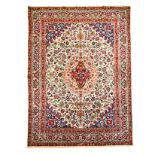 A TABRIZ CARPET, NORTH WEST PERSIA, MODERN the ivory field with a pale gold and red floral