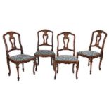 A SET OF FOUR WALNUT DINING CHAIRS, 19TH CENTURY each arched back-rail with an open carved splat and