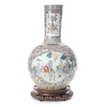 A CHINESE FAMILLE ROSE VASE, LATE 19TH CENTURY the globular body with elongated neck, painted with