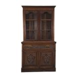 A MAHOGANY BUREAU BOOKCASE, LATE 19TH/EARLY 20TH CENTURY the moulded outswept cornice above a pair