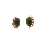 A PAIR OF GEM-SET EARRINGS each claw-set with an oval green gemstone, possibly nephrite, with