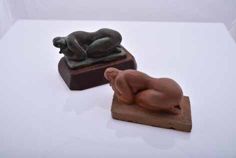 Frank Dobson (British 1888 --1963) NUDE, two terracotta height: 5cm Sold together with a bronze
