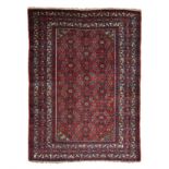 A FINE MELAYER RUG, WEST PERSIA, CIRCA 1950 the red field with an overall polychrome herati pattern,
