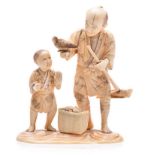 A JAPANESE CARVED IVORY OKIMONO OF A FARMER AND CHILD, MEIJI, 1868-1912 NOT SUITABLE FOR EXPORT