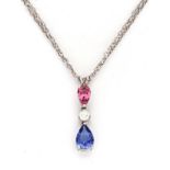 A TANZANITE, DIAMOND AND PINK TOURMALINE PENDANT claw-set with a pear-shaped pink tourmaline