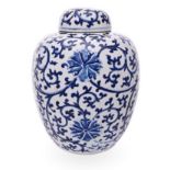 A CHINESE BLUE AND WHITE JAR AND COVER, EARLY 20TH CENTURY the tapering ovoid body painted overall