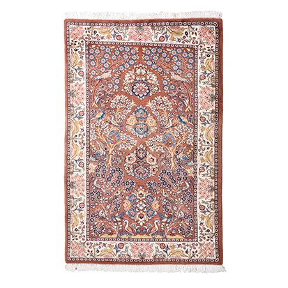 A QUM CARPET, PERSIA, MODERN the brown field with an ascending design of multicoloured flowering