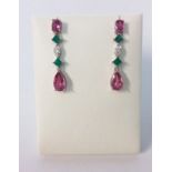 A PAIR OF PINK TOURMALINE, DIAMOND AND EMERALD PENDANT EARRINGS each surmount claw-set with an