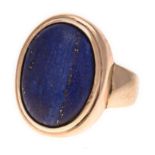 A LAPIS LAZULI RING the plain band centred with a bezel-set oval cabochon lapis lazuli, impressed