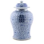 A CHINESE BLUE AND WHITE 'DOUBLE HAPPINESS' JAR AND COVER, 19TH CENTURY the baluster body painted