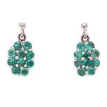 A PAIR OF EMERALD CLUSTER PENDANT EARRINGS each set with ten circular-cut emeralds weighing