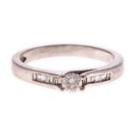 A DIAMOND RING centred with a round brilliant-cut diamond weighing approximately 0.18cts, the