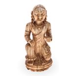 AN INDIAN CARVED IVORY FIGURE OF A KNEELING FEMALE FIGURE NOT SUITABLE FOR EXPORT wearing dhoti