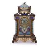 A FRENCH JAPANESQUE STYLE GILT BRONZE CHAMPLEVÉ MANTEL CLOCK, IN THE MANNER OF EDOUARD LIÈVRE, CIRCA