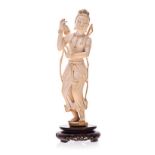 A CARVED IVORY FIGURE OF AN INDIAN DANCER, 19TH CENTURY NOT SUITABLE FOR EXPORT wearing flowing