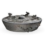 A CHINESE IRON GONG cast in high relief with four dragons against a filigree decorated ground, the