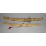 A JAPANESE CARVED IVORY HANDLED SHORT SWORD AND SCABBARD, MEIJI, 1868-1912 NOT SUITABLE FOR EXPORT