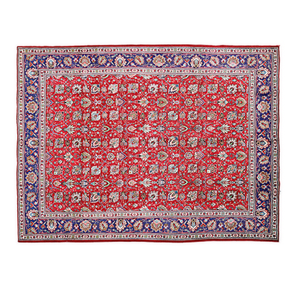 A TABRIZ CARPET, MODERN the red field with an overall design of multicoloured palmettes, vines and