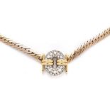 A 9CT GOLD AND DIAMOND NECKLACE composed of rose gold herringbone link chain, centred with an oval-