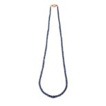 A SAPPHIRE NECKLACE comprised of sapphire beads, graduated in size, weighing approximately 117cts in