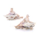 A PAIR OF MEISSEN FIGURAL SWEET MEAT DISHES, 19TH CENTURY modelled as a reclining maiden and