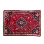 A KASHGAI RUG, SOUTH-WEST PERSIA, MODERN the red field with a blue stepped diamond medallion,