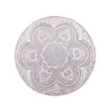 A MIDDLE EASTERN SILVER TRAY, MAKER'S MARK INDISTINCT of circular form, profusely engraved with