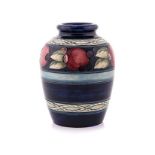 A WILLIAM MOORCROFT ‘POMEGRANATE’ PATTERN VASE, EARLY 20TH CENTURY the ovoid body tube lined and