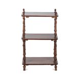 A LATE VICTORIAN MAHOGANY THREE-TIERED WHAT-NOT each rectangular shelf united by turned tapering