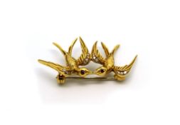 Ruby and diamond set swallow brooch