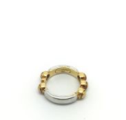 Garrard yellow and white gold ring, white gold bars spaced with two and three yellow gold discs,