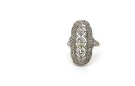 Art Deco c.1920 ring. 18ct gold and Platinum. 3 old cut diamonds in a panel surrounded by further