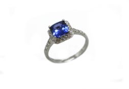 Tanzanite and diamond cluster ring